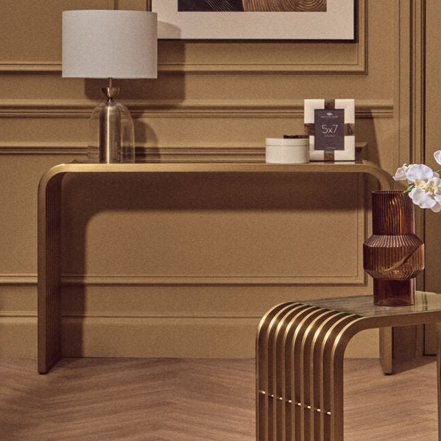 Vogue Clear Glass Console Table with Slatted Matt Gold Frame