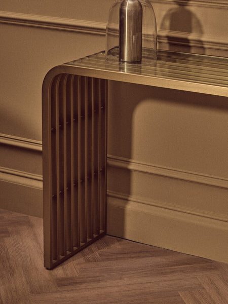 Vogue Clear Glass Console Table with Slatted Matt Gold Frame