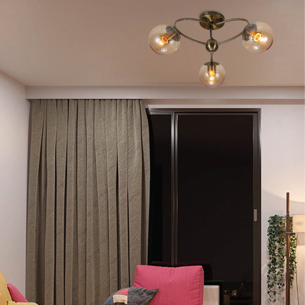 Textured Amber Globe Antique Brass Semi Circle Arm Semi Flush Ceiling Light
