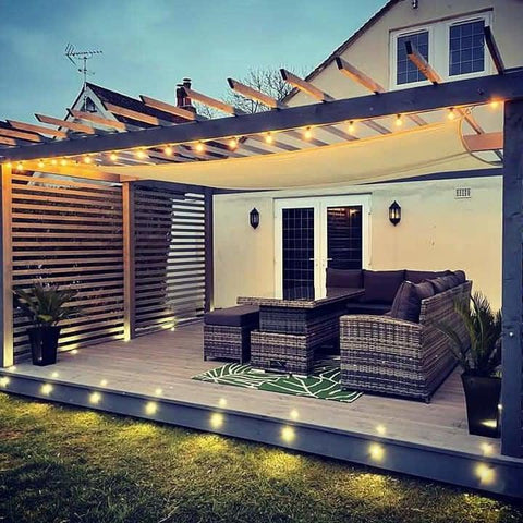 13m Super Festoon warm white outdoor LED string lights shown installed on a garden pergola